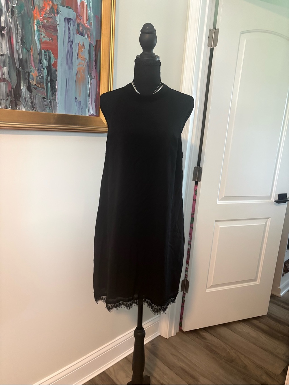 Black Sleeveless Shift Dress with Lace Hem